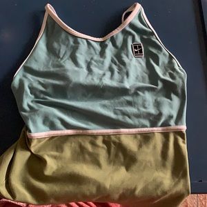 Small Nike Vintage Tank top, not sold anywhere anymore, built in sports bra